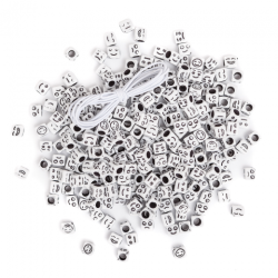 Black emoticon beads on a white base 285 pcs